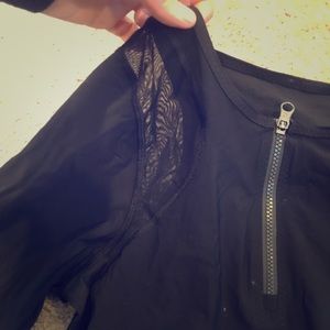 Swim top with mesh paneling